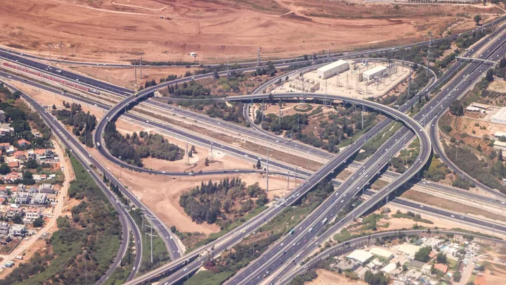 An aerial photograph of intersecting highways and curved connecting roads.